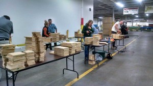 Deltec employees volunteering to build Carolina Northern Flying Squirrel nest boxes our of Deltec's scrap wood.